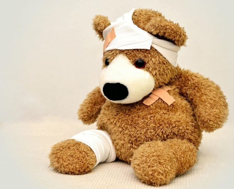New born baby's stuffed animal with injuries