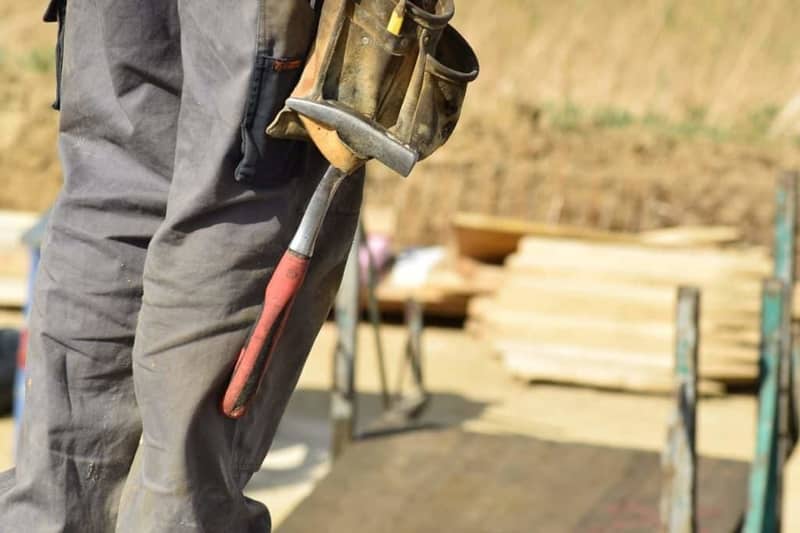 Construction worker with equipment and tools